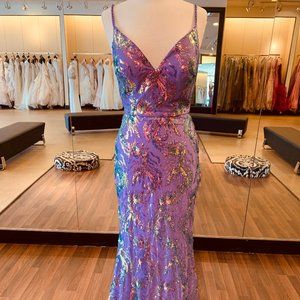 Fitted gown with a sweetheart neckline, sequins
